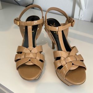 Yves Saint Laurent Tribute 3” heals in glossy tan.